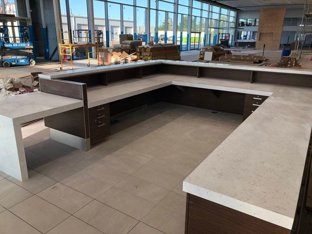 Black Pearl Granite countertop, Customer lounge + reception, at Toyota on Regent, Winnipeg