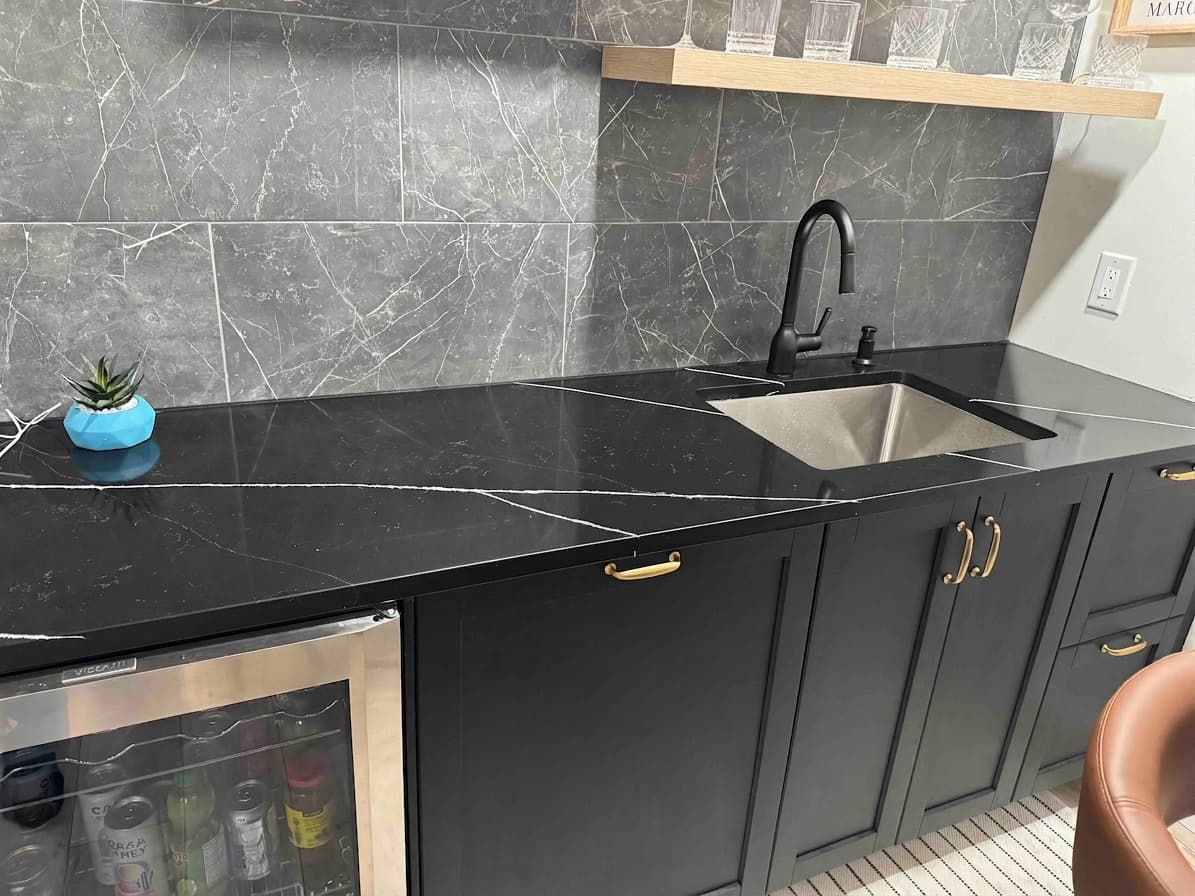 Empira Black Quartz countertop, Lower-level wet bar, in Linden Woods, Winnipeg