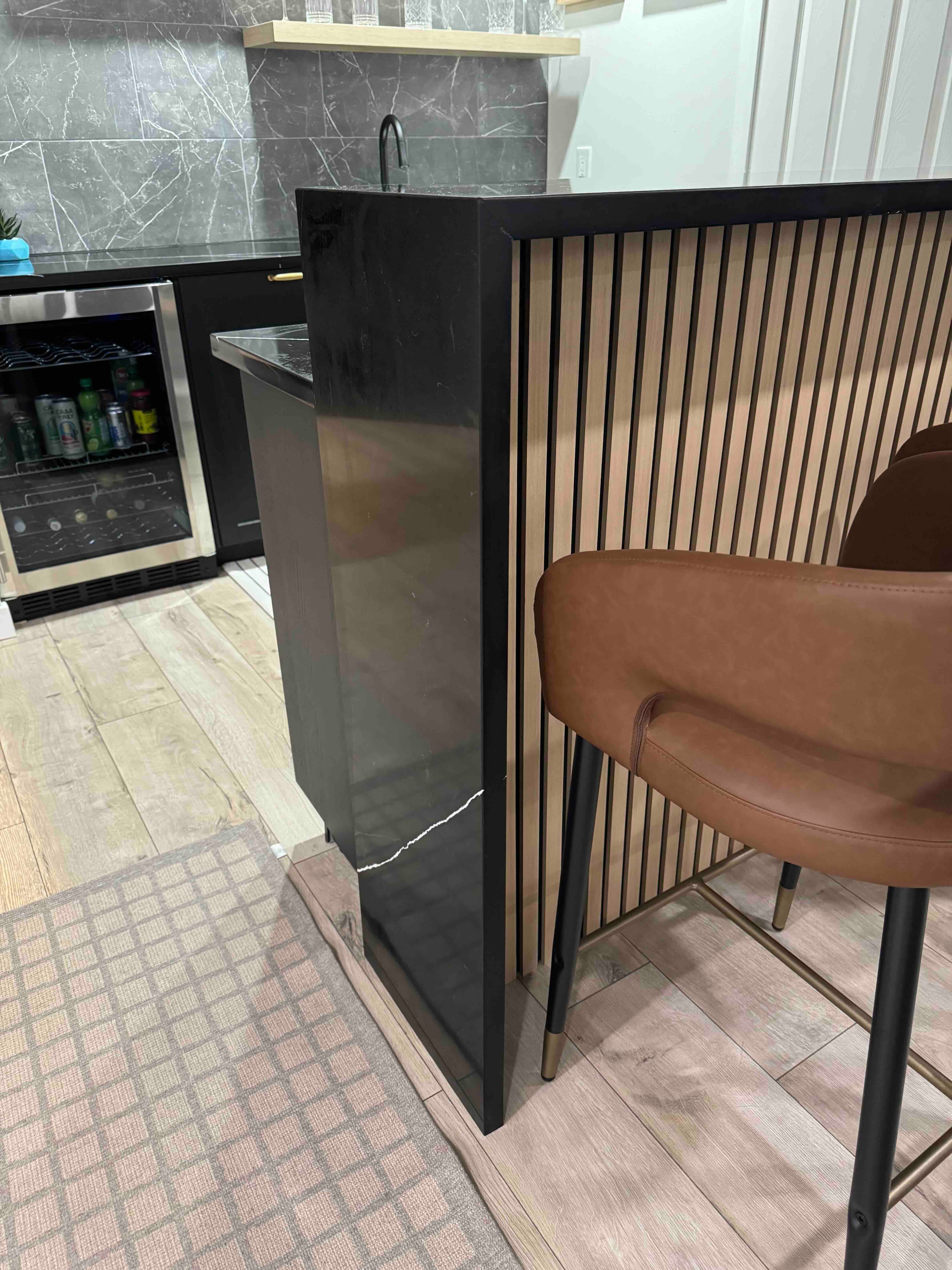 Empira Black Quartz countertop, Lower-level wet bar, in Linden Woods, Winnipeg