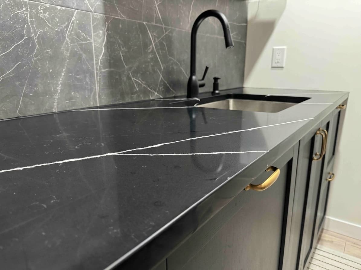 Empira Black Quartz countertop, Lower-level wet bar, in Linden Woods, Winnipeg