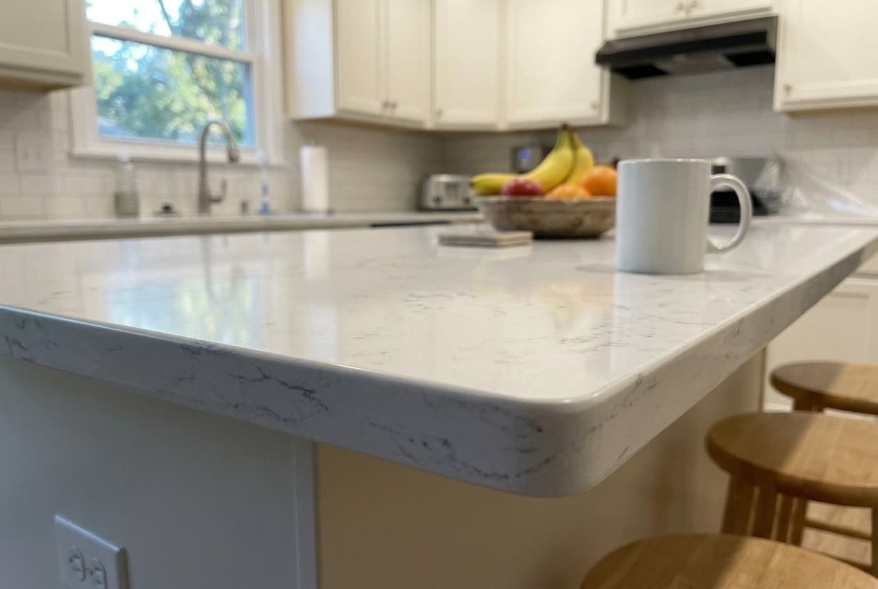 Calacatta Laza Quartz countertop, Designer kitchen reno, in Crescentwood, Winnipeg