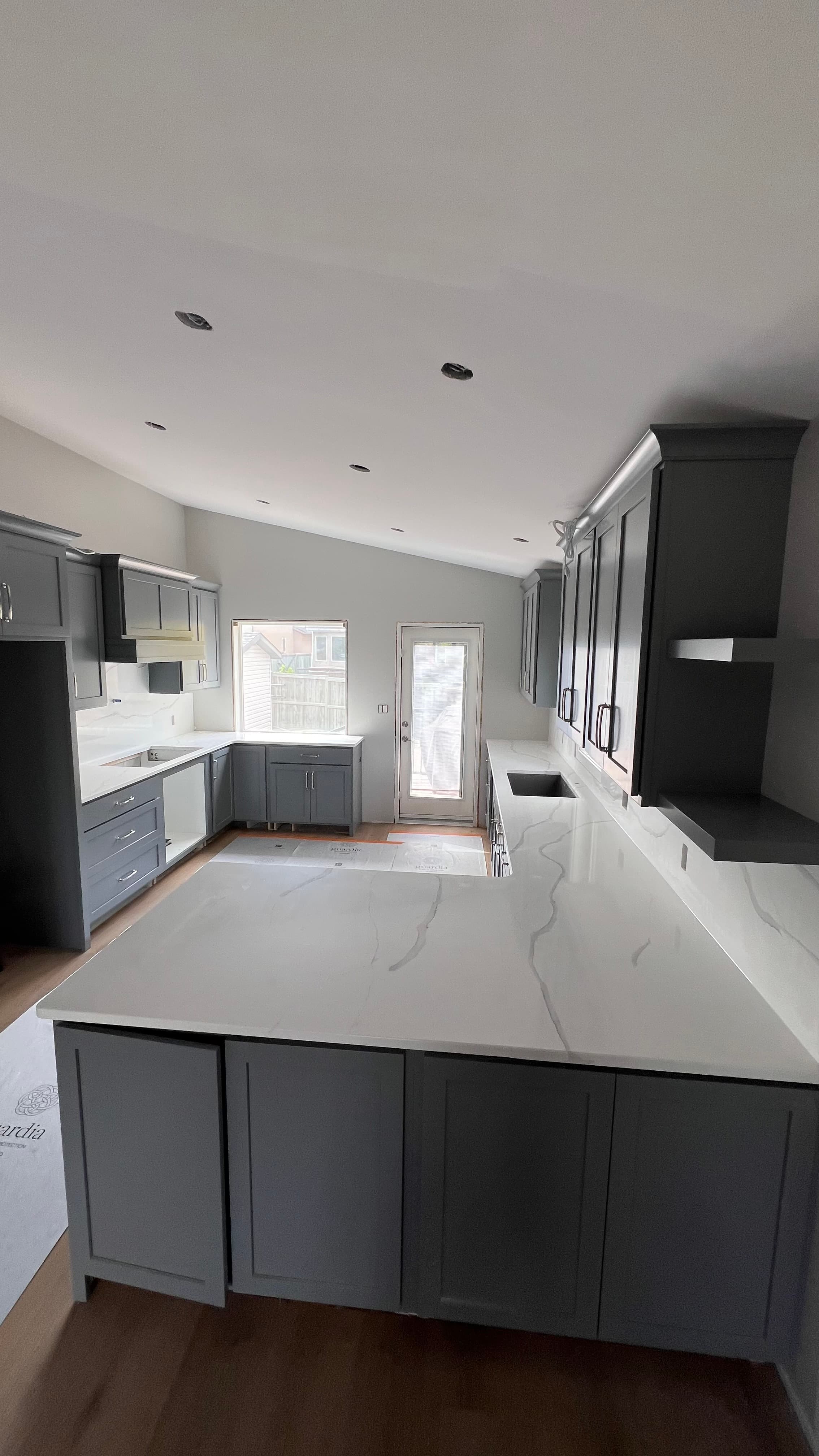 Frosty Carrina Quartz countertop, New build kitchen, in Bridgwater Forest, Winnipeg