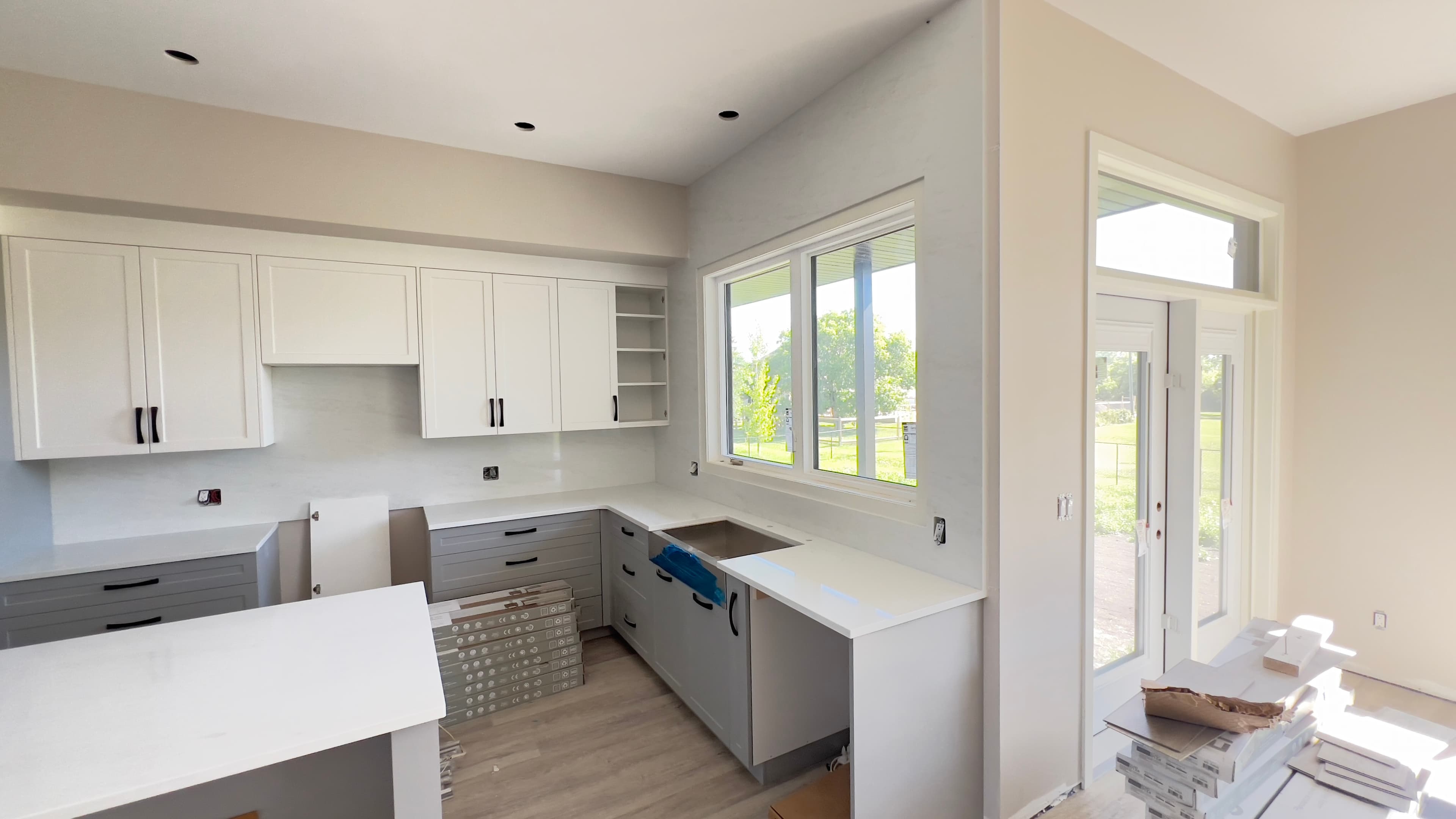 Taj Mahal Quartzite countertop, Open-concept reno, in Sage Creek, Winnipeg
